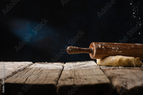 Wooden rolling pin and dough Baking and cooking dough Pizza bread Advertising banner Food preparation