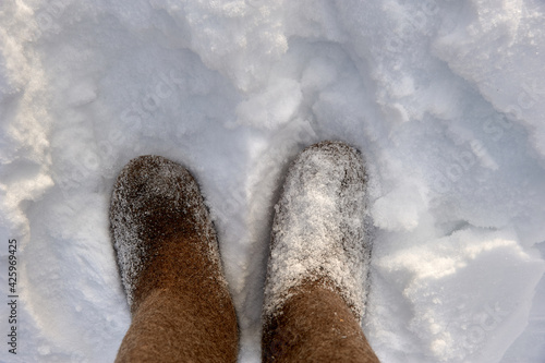 Russian boots in the snow on a cold winter day. photo