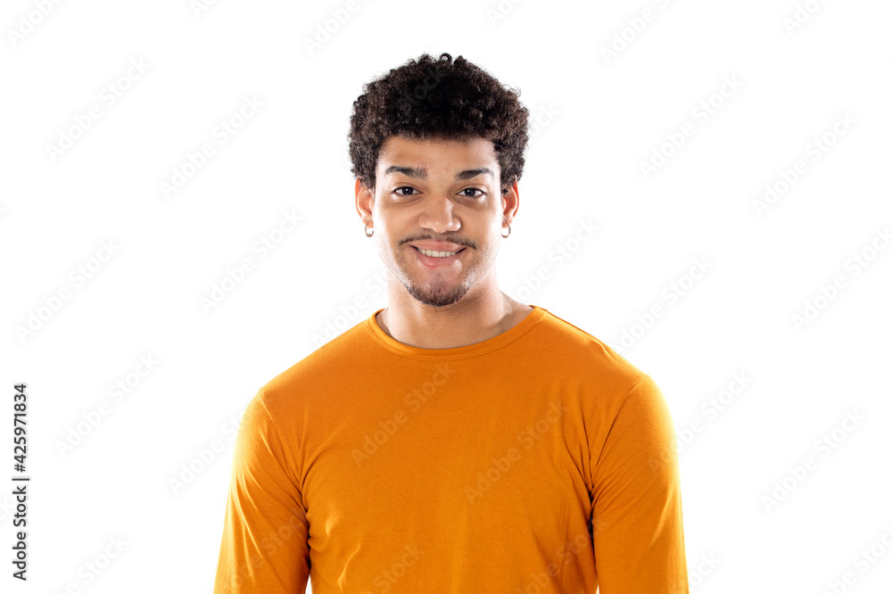 Smiling young man with afro hair wearing orange sweater Smiling young man with afro hair wearing orange sweater
