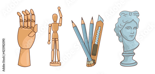 Set with art materials. A puppet, a wooden doll and a wooden hand on hinges, pencils and a stationery knife. Plaster head of David. Design element, layout, print.