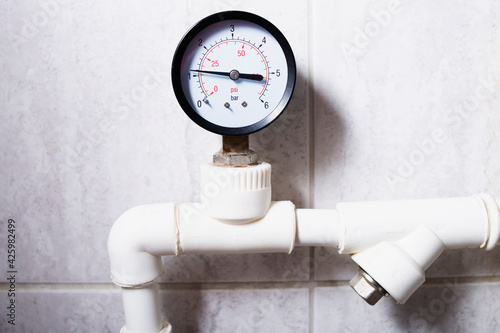 Manometer, water pressure gauge in the home heating system.