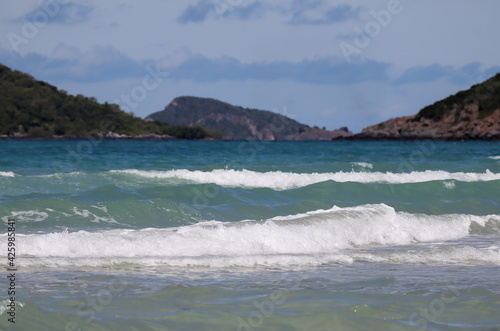 Sea waves on the Nam Sai Beach, Thailand. clear water of sea waves on the beautiful beach. 