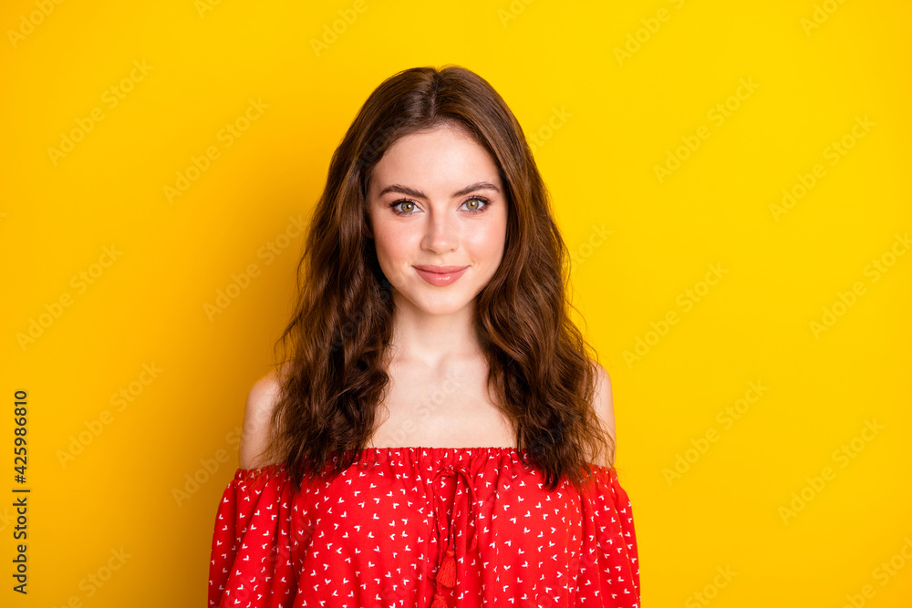 Photo of charming attractive young woman smile wear off-shoulder blouse isolated on yellow color background Photo of charming attractive young woman smile wear off-shoulder blouse isolated on yellow color background