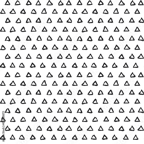 Seamless pattern of lined white triangles. A seamless pattern made with hand drawn triangles.
