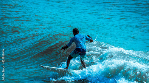 Photography Extreme Sports and Action Photography - Picture of Surfer Man Surfing On Blue Oc
