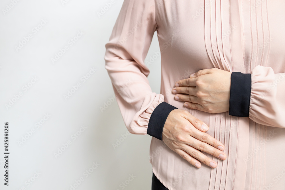 Asian woman patient with abdominal pain on right side belly,painful in