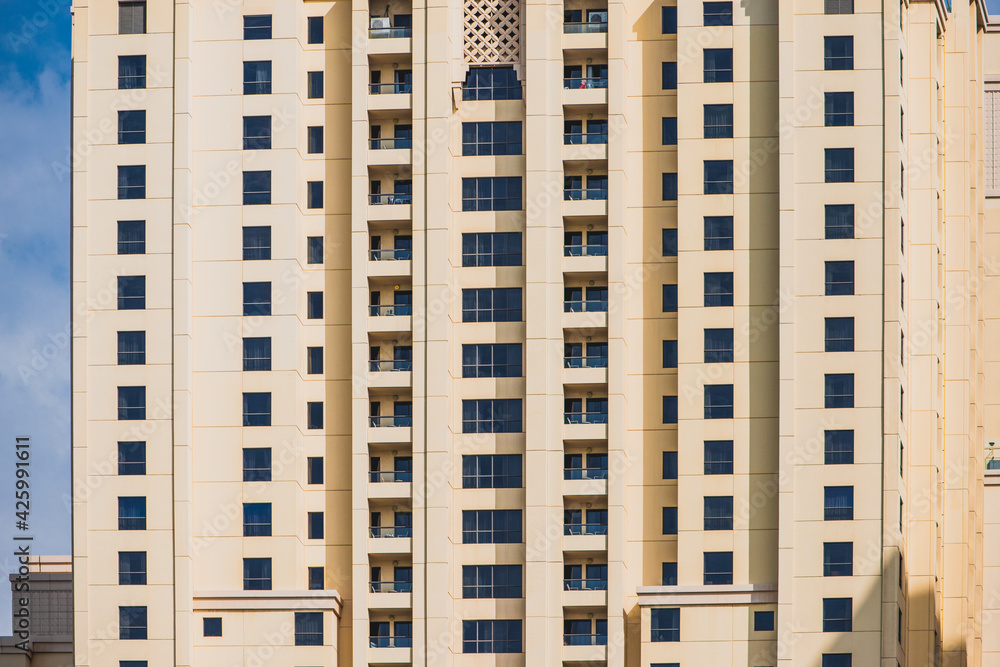 Residential real estate buildings and urban development in Dubai - closeup view Residential real estate buildings and urban development in Dubai - closeup view