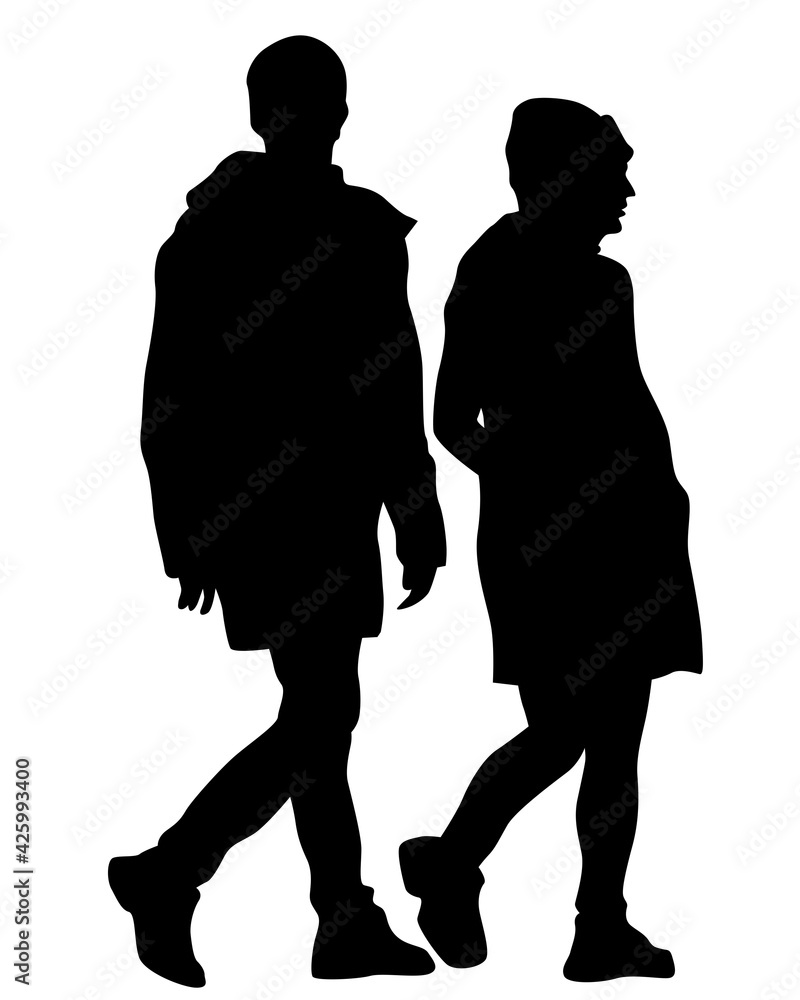 Young man and woman walking down the street. Isolated silhouette on a white background
