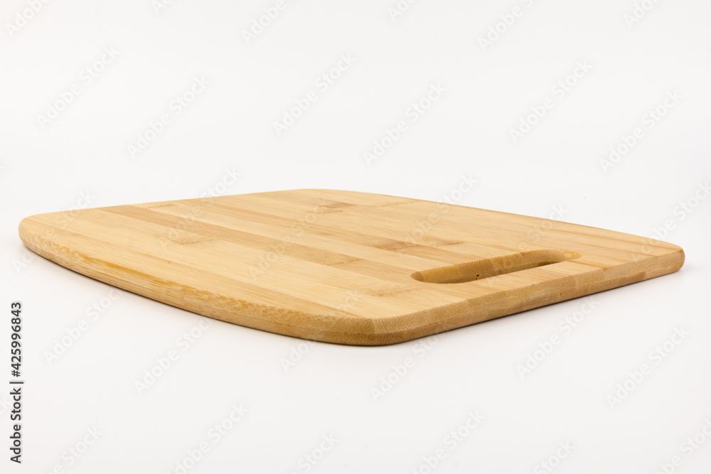 Top view high quality wood cutting board, brown wood. Chopping boards made from natural bamboo. Isolated image kitchen utensil on white background.