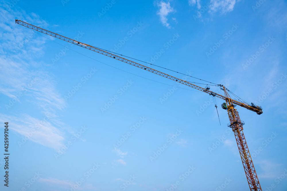 Construction crane, Industrial construction cranes and building at Construction site. Construction crane, Industrial construction cranes and building at Construction site.