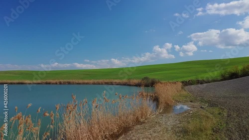 landscape with river in tuscany countryside