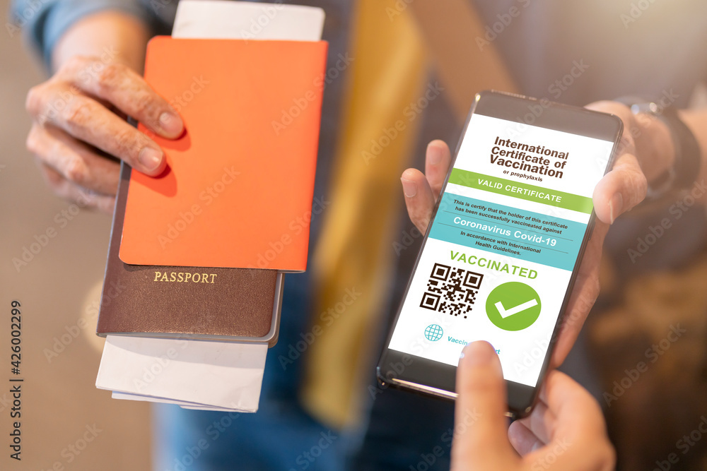 Smartphone displaying a valid digital vaccination certificate passport ...