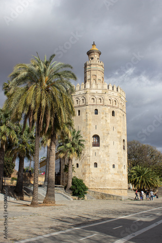The Golden tower at the Guadalquivir in Seville is one of Seville's iconic landmarks. It´s a military observation tower built by the Almohads in the 12th century and was part of the Moorish city wall