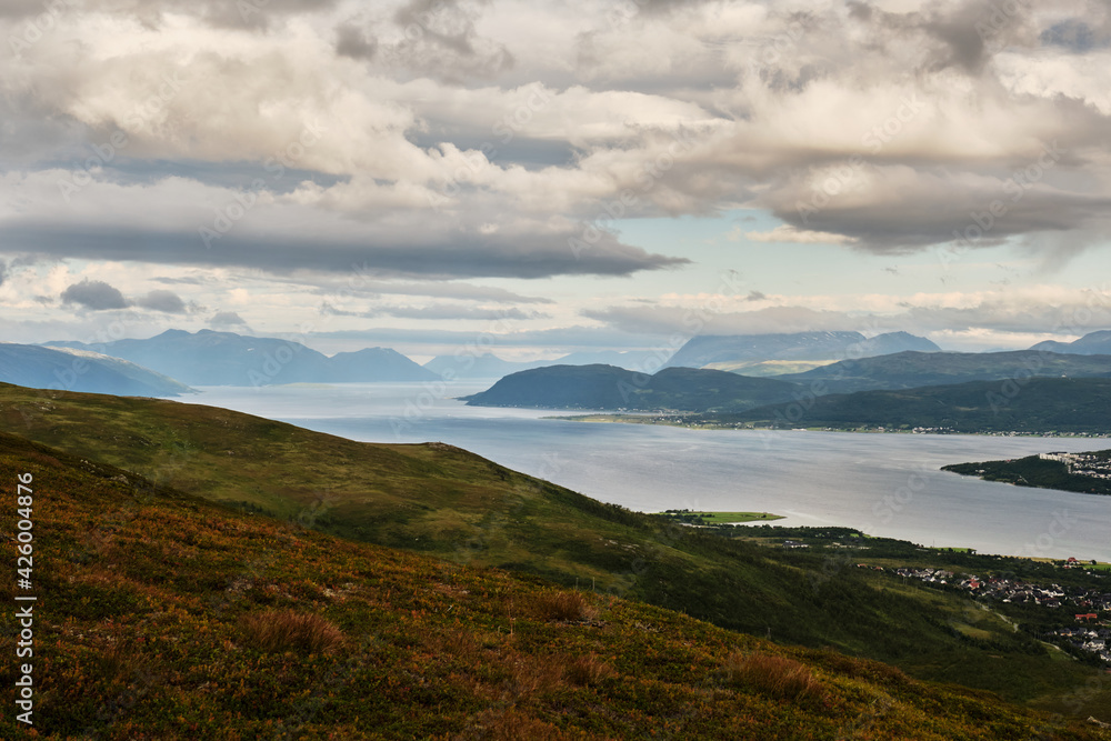 Scenic view of clouds and mountains over the sea from the top of a mountain in Norway