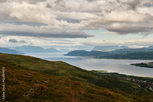 Scenic view of clouds and mountains over the sea from the top of a mountain in Norway