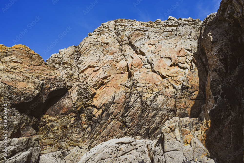 .Rocky ocean coast in France, beautiful rock blocks.