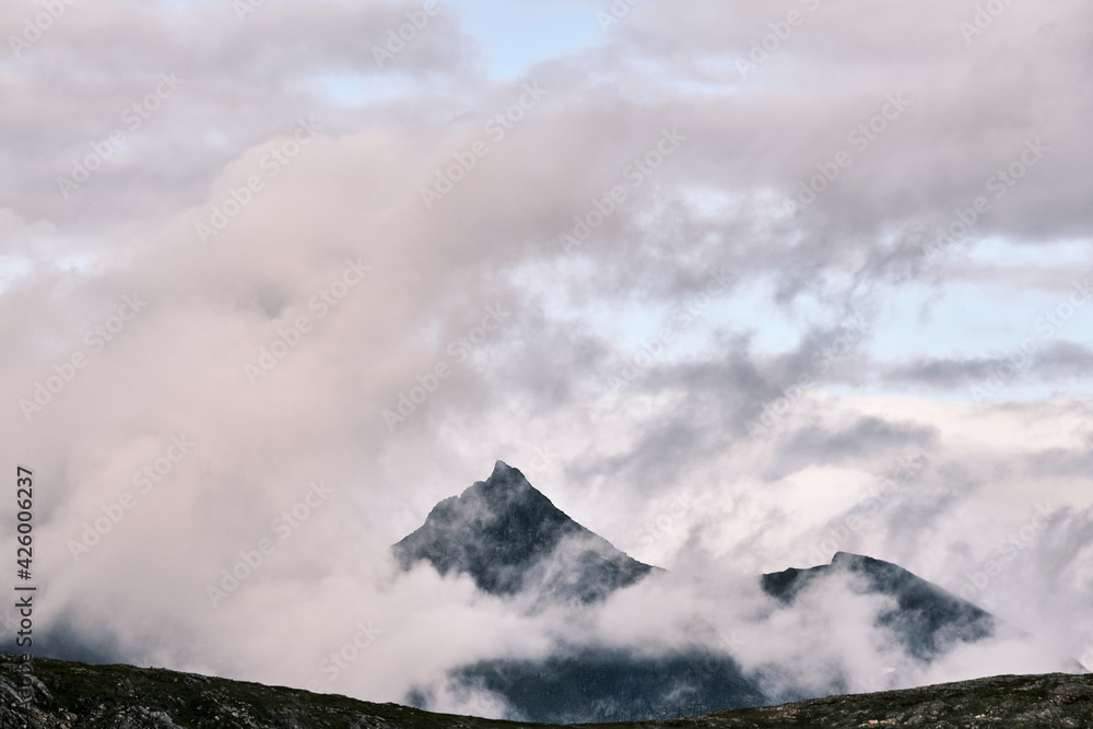 Scenic view of  clouds and mountains near Tromso
