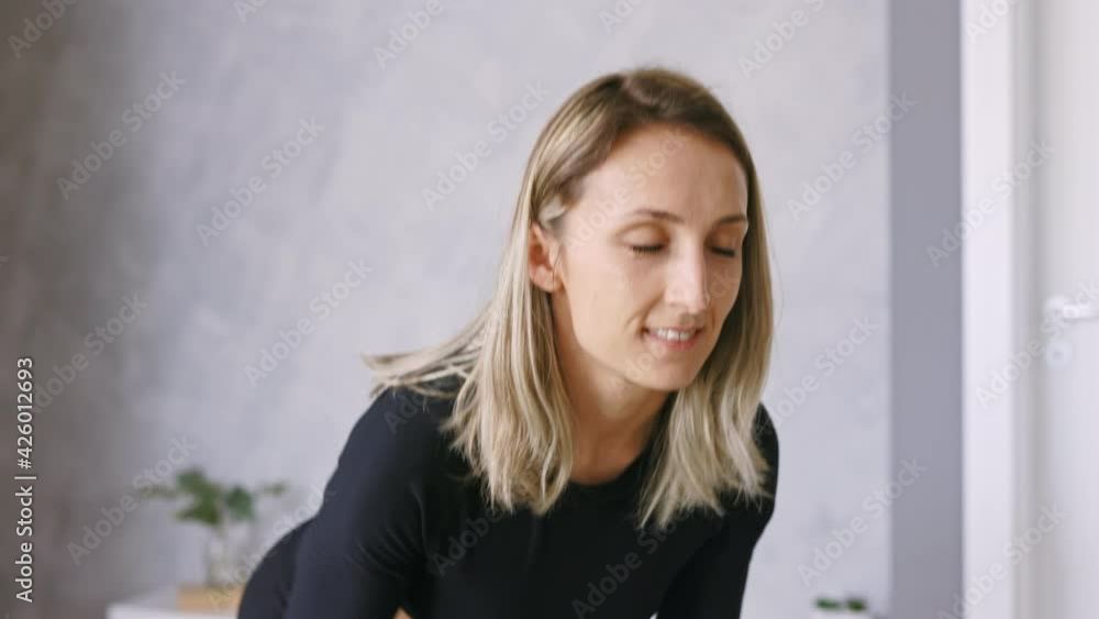Happy Woman lifting Weights Dumbbells and Exercising at Home, doing Workout Routine in Cozy Living Room, Close Up, Copy Space, Real Time Happy Woman lifting Weights Dumbbells and Exercising at Home, doing Workout Routine in Cozy Living Room, Close Up, Copy Space, Real Time