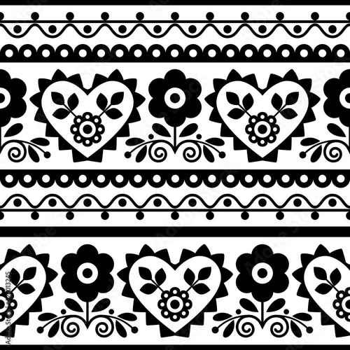 Polish traditional vector black seamless pattern with flowers and hearts inspired by folk art embroidery Lachy Sadeckie - textile or fabric print ornament 