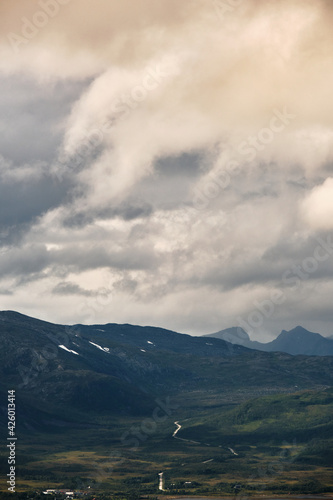 Scenic view of clouds and mountains near Tromso