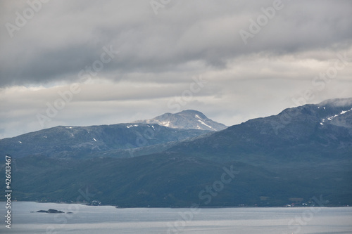 Scenic view of clouds and mountains near Tromso