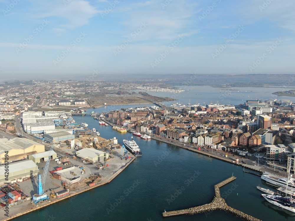 aerial view of Poole harbour and the historic Quay area seen on a sunny calm morning