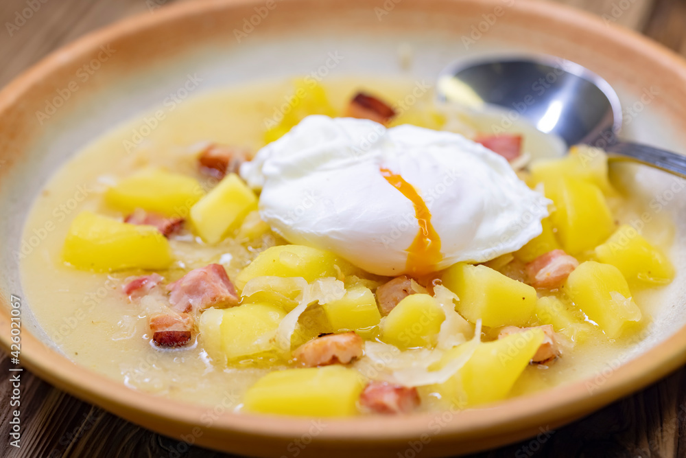 Czech traditional cabbage soup with smoked meat and potatoes Czech traditional cabbage soup with smoked meat and potatoes