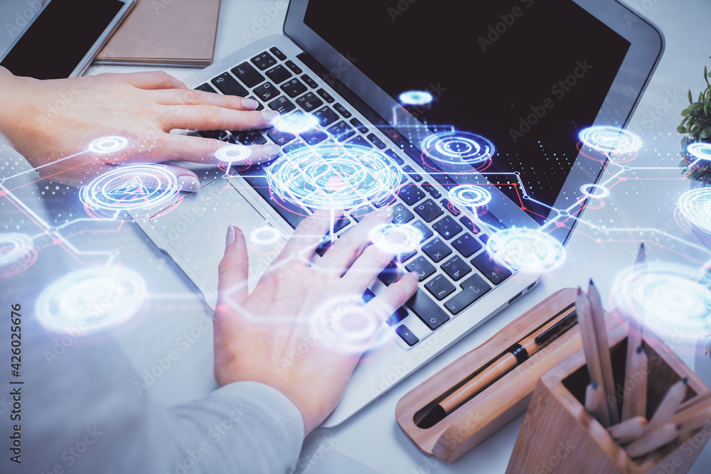 Double exposure of woman hands typing on computer and social network theme hologram drawing. People media concept. Double exposure of woman hands typing on computer and social network theme hologram drawing. People media concept.