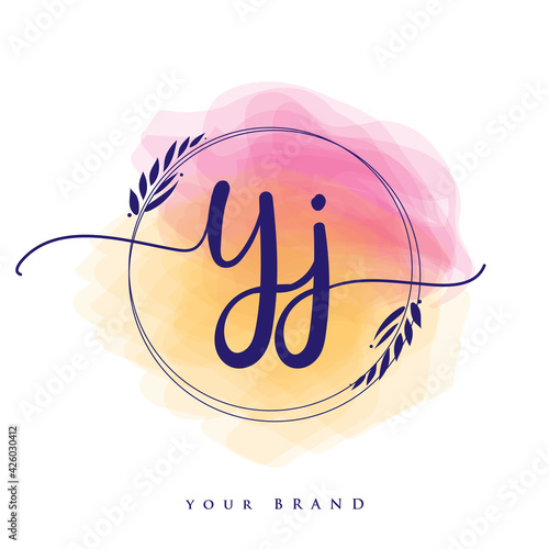 YJ Initial handwriting logo. Hand lettering Initials logo branding, Feminine and luxury logo design isolated on colorful watercolor background. photo