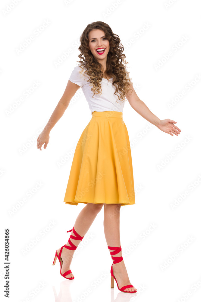 Happy Young Woman In Is Walking And Laughing