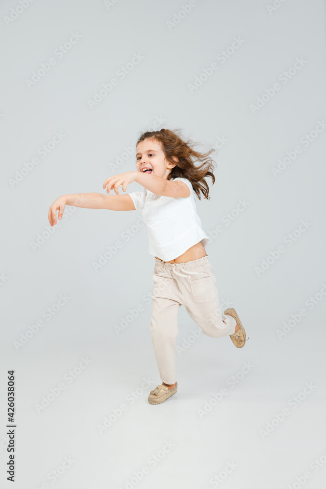 Pretty caucasian girl portrait isolated on white studio background with copyspace Pretty caucasian girl portrait isolated on white studio background with copyspace
