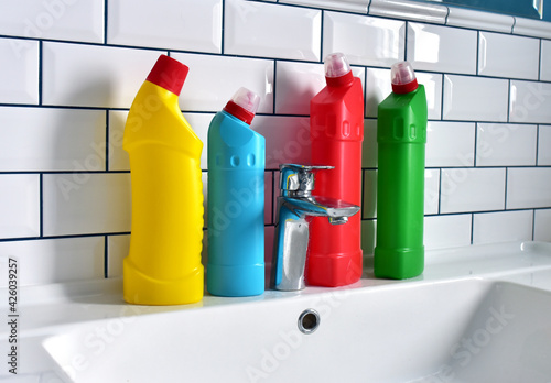 Wallpaper Mural Detergent bottles and detergent spray cleaner in the bathroom on washbasin. Household for cleaning and washing. Concentrated and anti-bacterial liquids for dishwasher. Detergents and laundry concept Torontodigital.ca