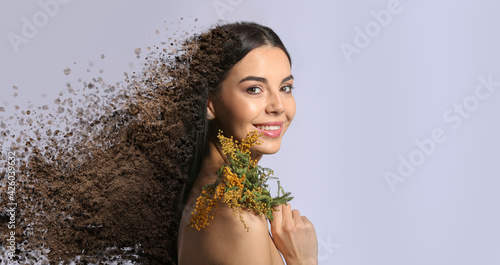 Beautiful young woman with ...