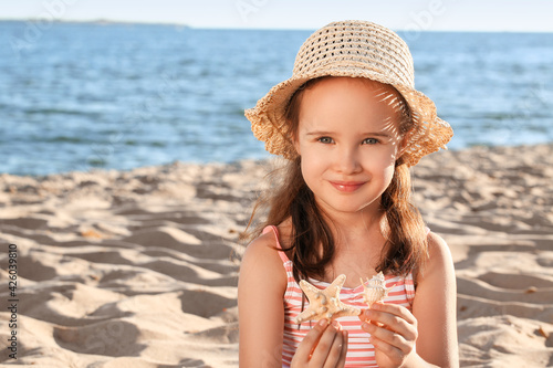 Cute little girl on sea beach