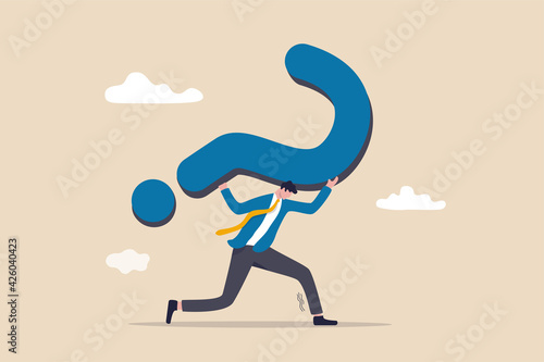 Hard question with no answer or solution, critical business problem, doubtful or stress burden concept, frustrated tried businessman carrying heavy big question mark sign burden.