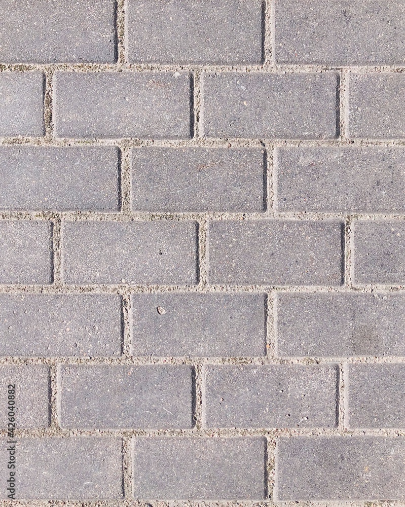 Brick grey path Background Shot-line between tiles Brick grey path Background Shot-line between tiles