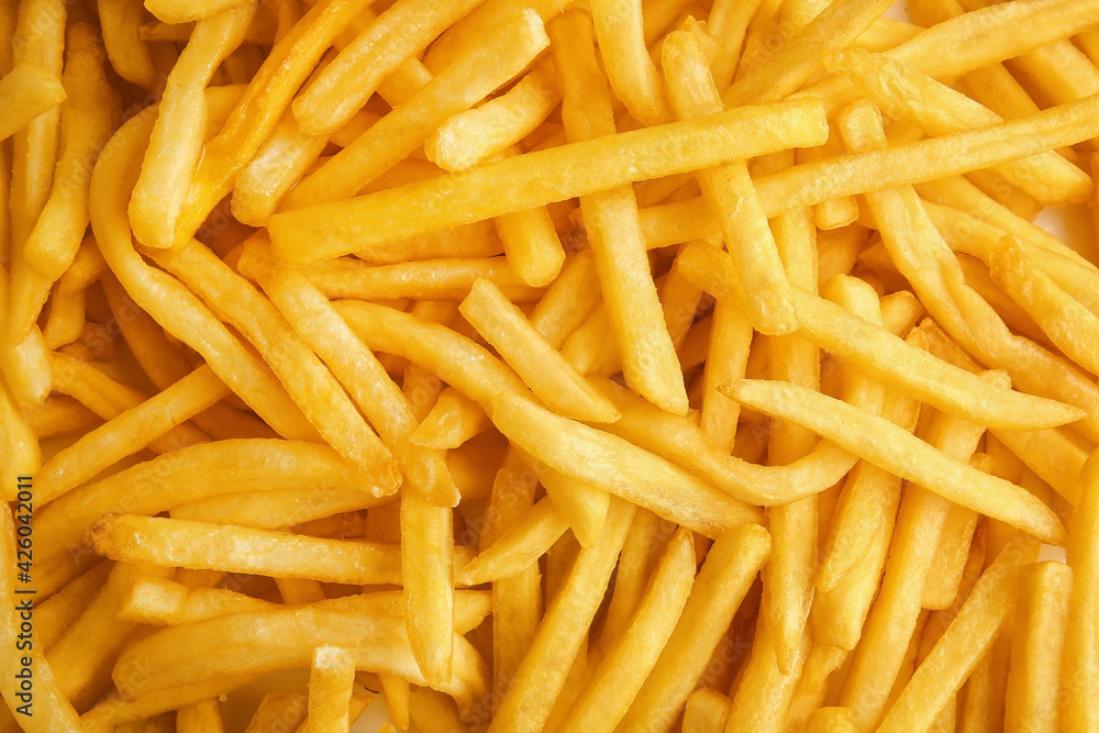 Heap of tasty french fries as background Heap of tasty french fries as background