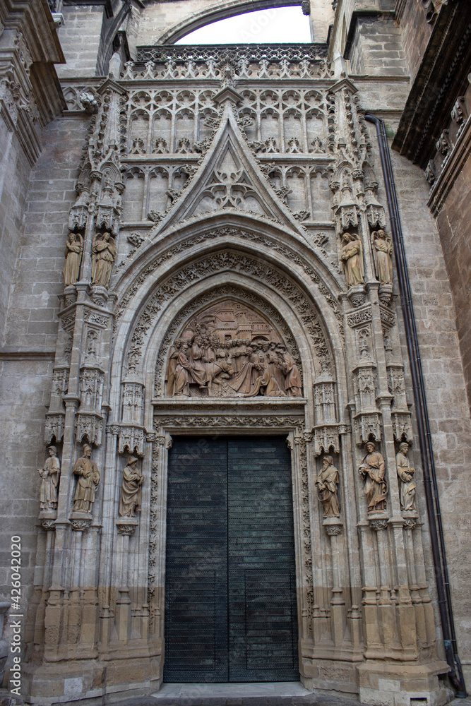 Bell's door at the cathedral of Santa María, is a Roman Catholic cathedral in Seville, Andalusia, Spain. It is the largest Gothic church and was registered by UNESCO as a World Heritage Site. 