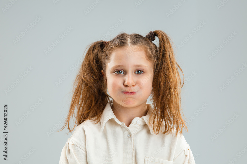 Pretty caucasian girl portrait isolated on white studio background with copyspace Pretty caucasian girl portrait isolated on white studio background with copyspace