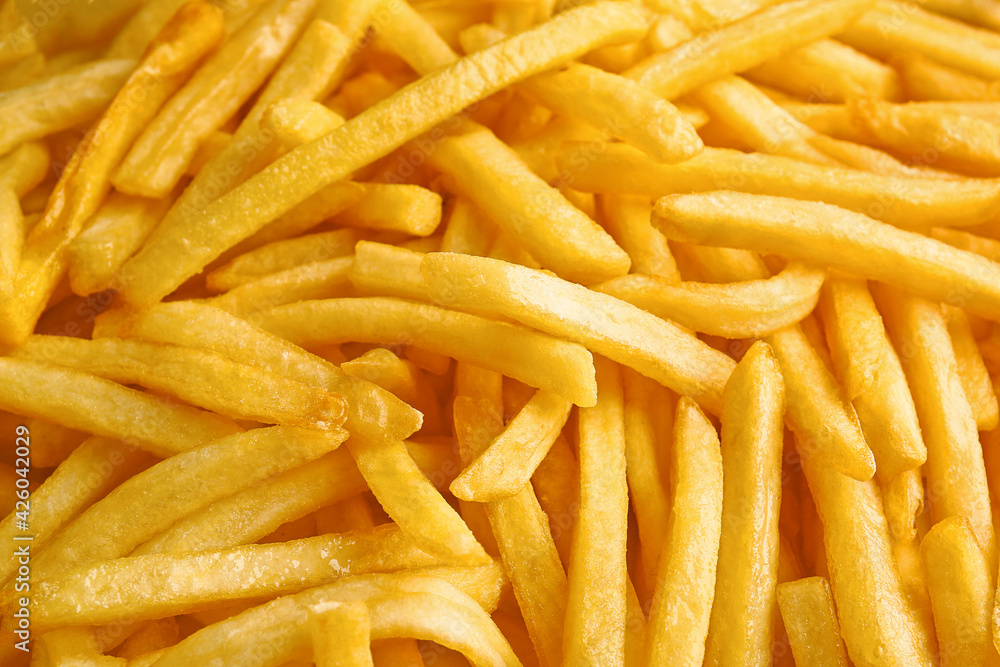 Heap of tasty french fries as background Heap of tasty french fries as background