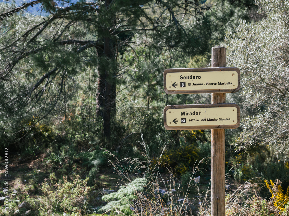 Sign for a trail in the Sierra Blanca mountain, Marbella towards El Juanar mountain and lookout. Costa del Sol, Spain