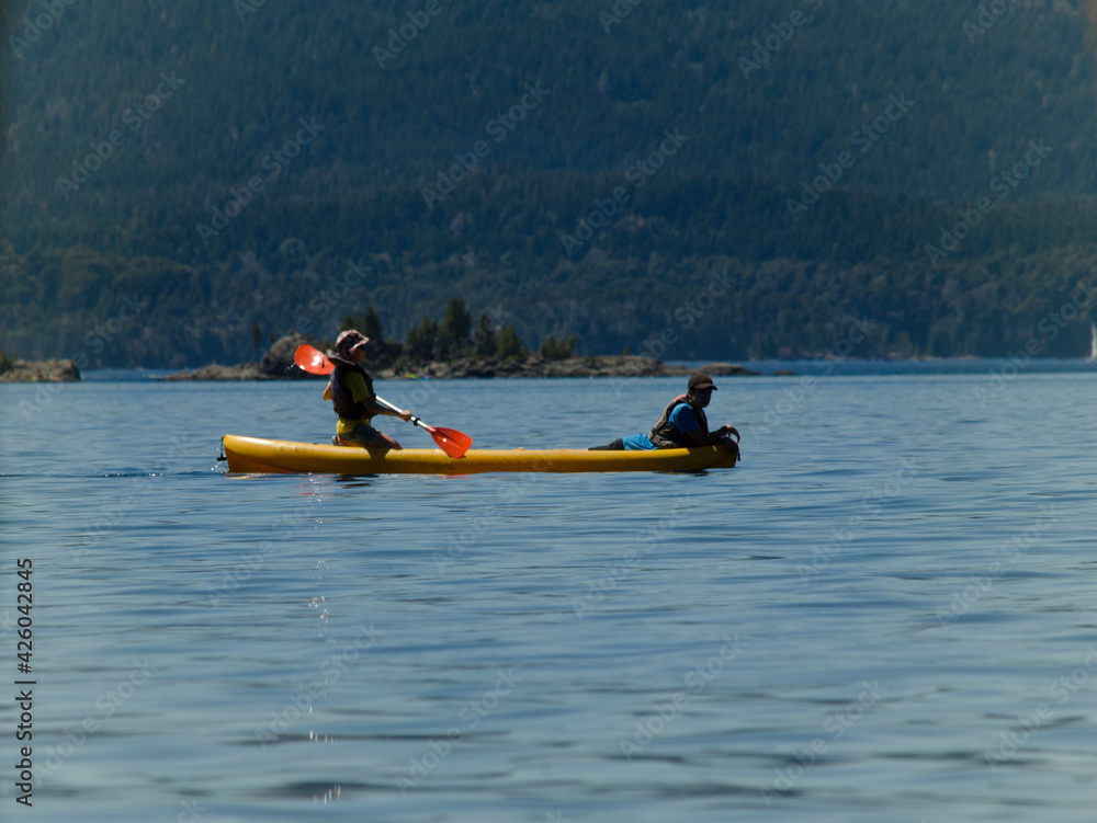Naklejka premium two people kayaking on a lake in Patagonia Argentina
