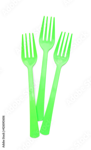 Plastic forks on white background