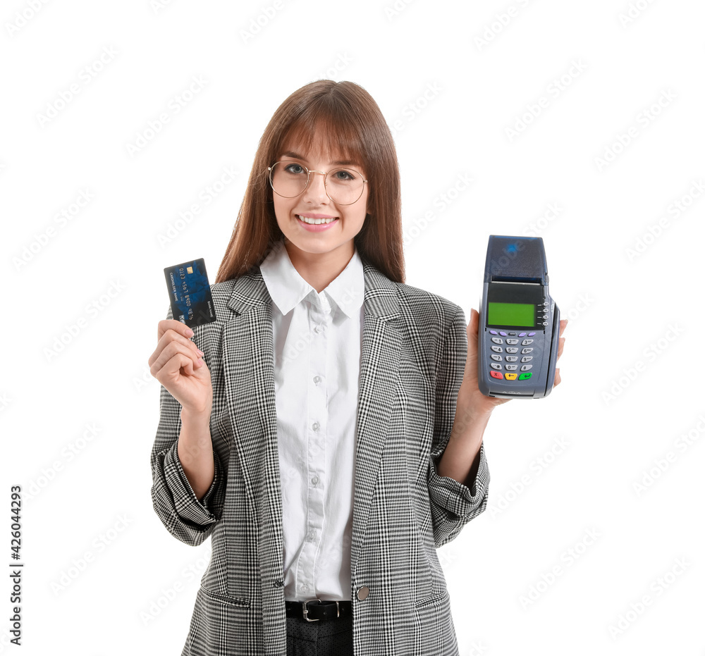 Young businesswoman with payment terminal and credit card on white background Young businesswoman with payment terminal and credit card on white background