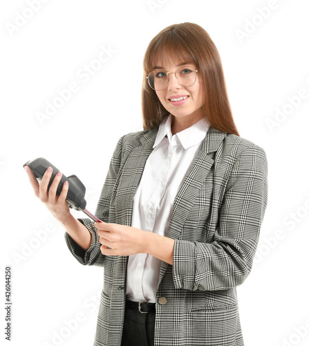 Young businesswoman with pa...