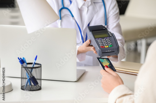 Patient paying for consulta...