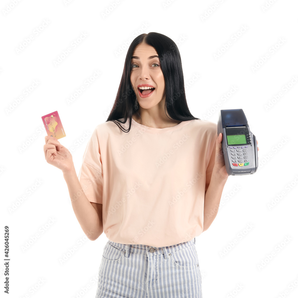 Young woman with payment terminal and credit card on white background Young woman with payment terminal and credit card on white background