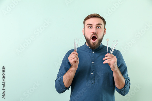 Shocked young man with dent...