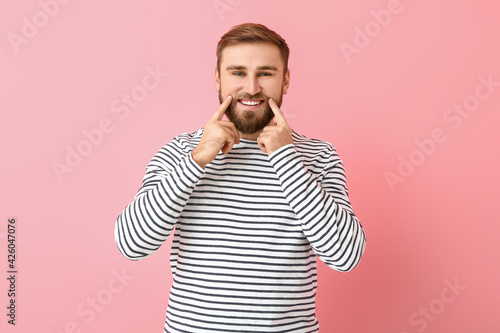 Handsome smiling young man ...