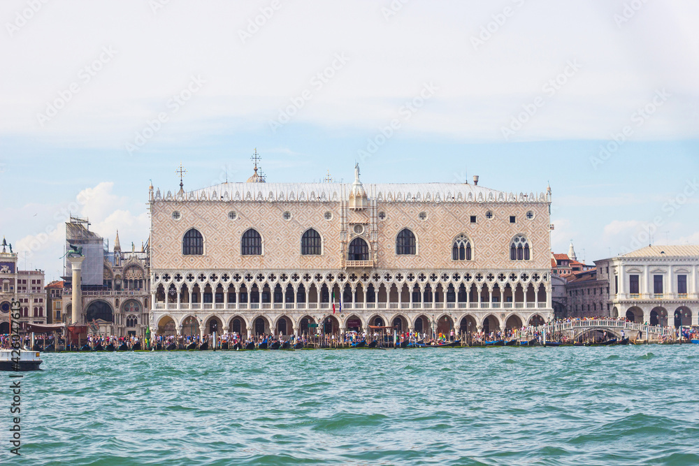 Famous Doge's palace on Piazza di San Marco, view from the the Grand Canal in Venice, Italy. Italian buildings cityscape. Famous romantic city on water